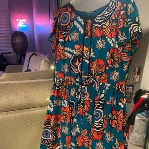 Gently used, turquoise and colorful dress.